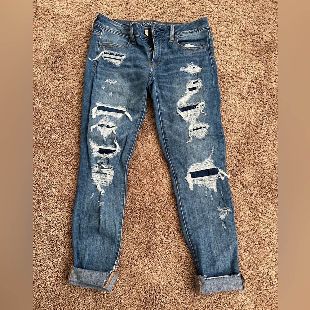 AE Tattered Skinny Jeans